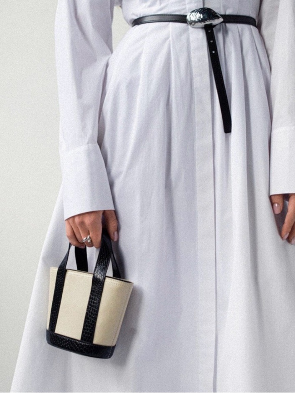 STAUD Two-Tone Mini Bucket Bag in Black & Cream with Crossbody Strap